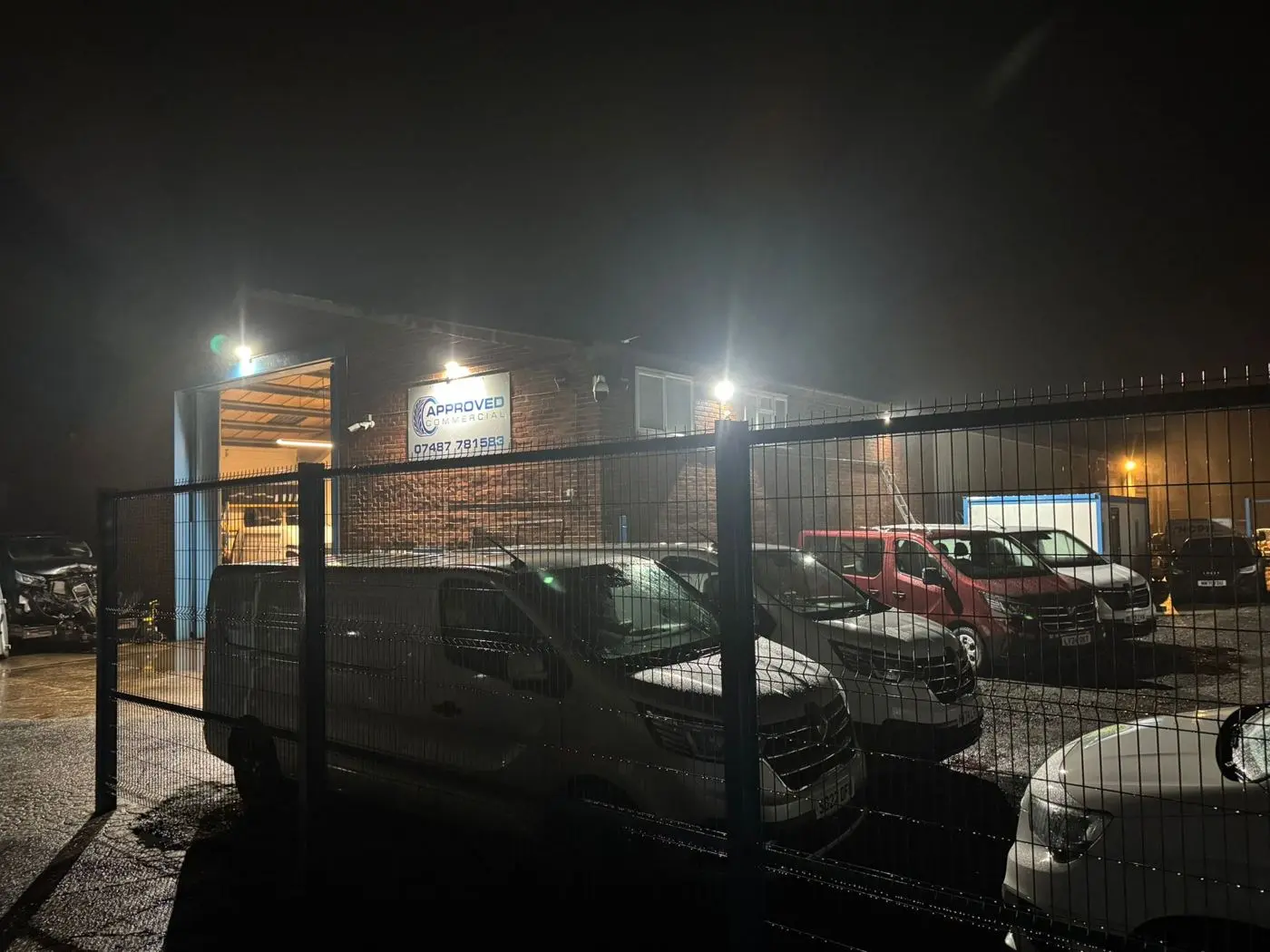 Commercial electrical work on an industrial unit at night, electrician website photography
